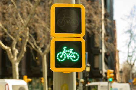 Traffic lights for bicycles on a beautiful sunny day in Barcelona. Green light for sports concept. Healthy livingの写真素材