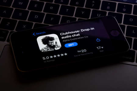 Clubhouse application view on the smartphone, controversy 2021 that hides behind the Social app. Clubhouse drop in audio chat application view on the smartphoneのeditorial素材