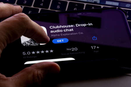 Clubhouse application view on the smartphone, controversy 2021 that hides behind the Social app. Clubhouse drop in audio chat application view on the smartphoneのeditorial素材