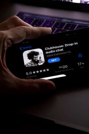 Clubhouse application view on the smartphone, controversy 2021 that hides behind the Social app. Clubhouse drop in audio chat application view on the smartphoneのeditorial素材