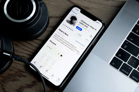 Clubhouse application view on the smartphone, controversy 2021 that hides behind the Social app. Clubhouse drop in audio chat application view on the smartphoneのeditorial素材