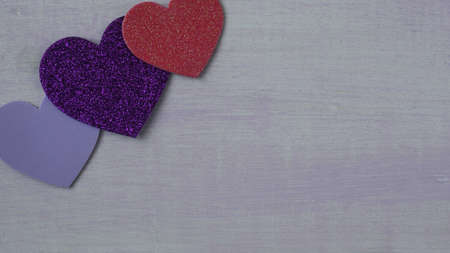 Hearts on Pink Wooden Background