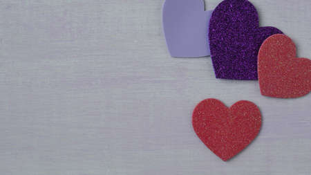 Hearts on Pink Wooden Background