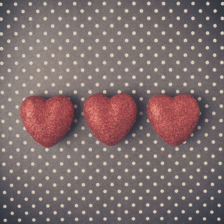 Hearts with red glitter on Polka Dot Background