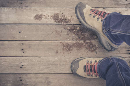 Feet. First-Person view  on rustic wood Floor background.