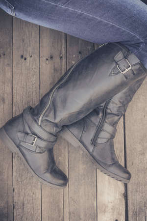 Feet. First-Person view  on rustic wood Floor background.