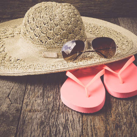 beach accessories on wooden board backgroundの写真素材