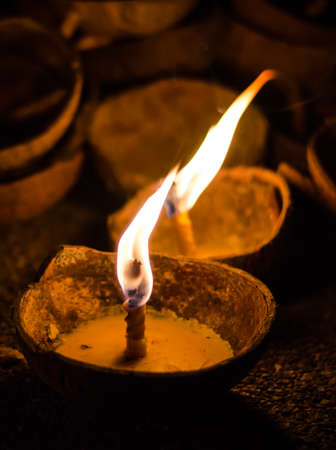Burning Candles in Coconut Shellsの写真素材