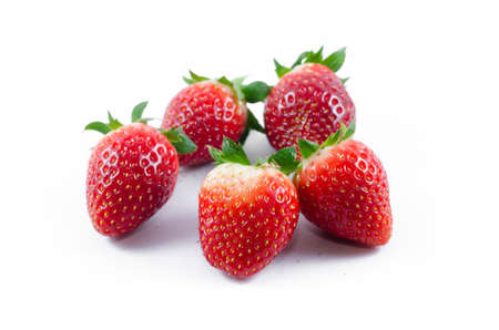 Fresh strawberries were placed on a white backgroundの写真素材