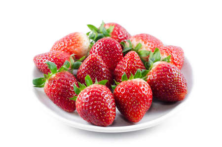 Fresh strawberries were placed on a white backgroundの写真素材