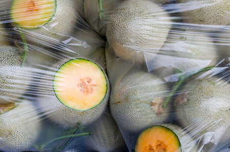 The melon in plastic bagsの写真素材