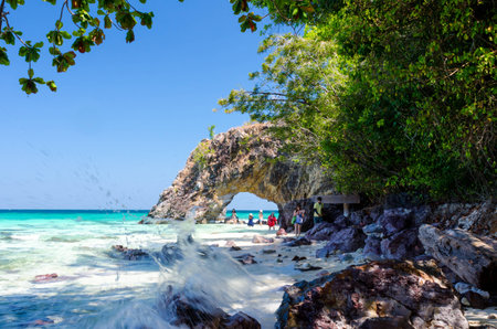 SATUN, THAILAND - 15 February   Natural stone arch with beautiful beach at Kho Khai near Tarutao national park and Koh Lipe February 15, 2014 in Satun, Thailandのeditorial素材