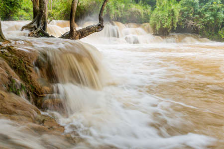 Waterfall in Luang prabang is Guangxi Waterfall over the turbid waterの写真素材