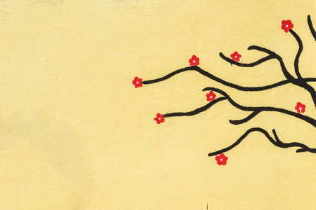 Drawing plum blossom in spring on the wallの写真素材