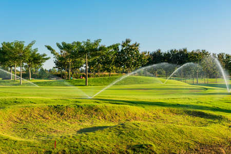 Watering in golf courseの写真素材