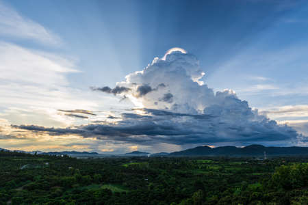 Colorful sunset over the mountain hillsの写真素材