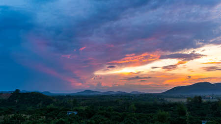Colorful sunset over the mountain hills