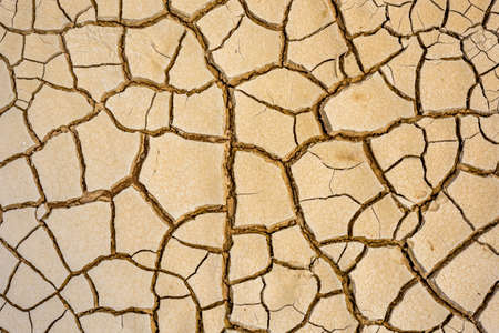Abstract background of cracked earthの写真素材