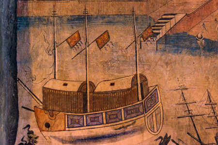 Ancient Buddhist temple the famous mural painting at Wat Phumin, a famous temple in Nan province,Thailand. The temple is open to the public.のeditorial素材