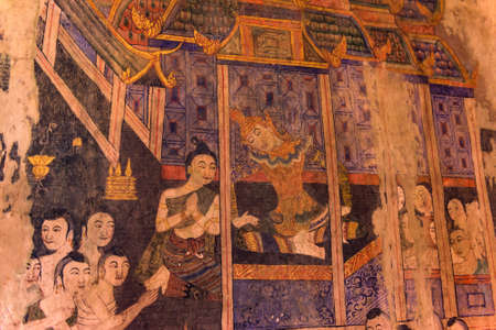 Ancient Buddhist temple the famous mural painting at Wat Phumin, a famous temple in Nan province,Thailand. The temple is open to the public.のeditorial素材