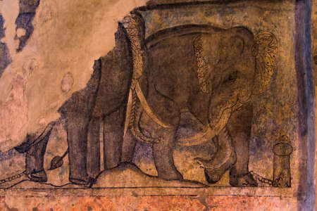 Ancient Buddhist temple the famous mural painting at Wat Phumin, a famous temple in Nan province,Thailand. The temple is open to the public.のeditorial素材