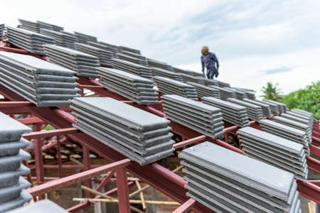labor working in construction site for roofの写真素材