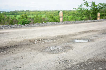 rough bumpy stone road in ruralの写真素材