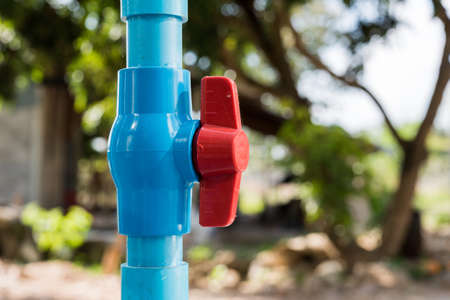 Water valve connects to PVC pipe.