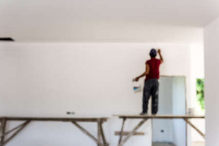 Working is painting (out of focus).の写真素材