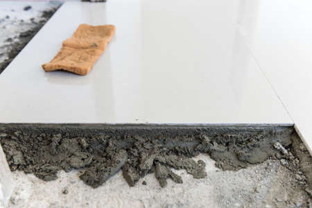 Ceramic tiles and cement mortar before laying tile, building construction.
