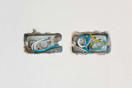 Wire box with different colored cables for power outlet installation.の写真素材