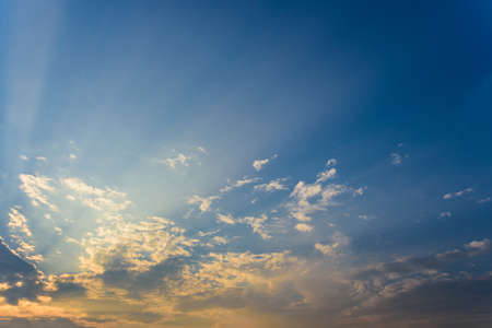 sun rays are striking through the clouds