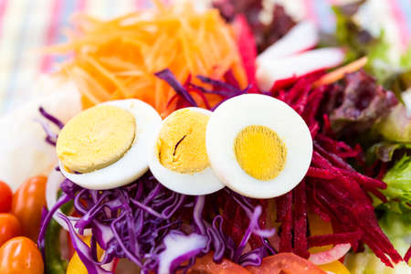 fresh vegetable salad with eggsの写真素材