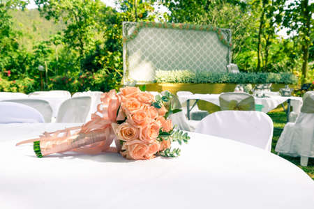 Wedding bouquet with roses on tableの写真素材