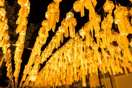 The line of Lantern in Loy krathong festival. Lightened lanterns by the night. Colorful Lamp and lantern in Loi Krathong Wat Phra That Haripunchai ,Lamphun ,Thailandの写真素材