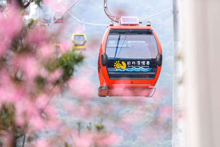 Sun Moon Lake Cable Car ,Taiwan Nantou -March 28, 2017:Sun Moon Lake Cable Car Transporting tourists.のeditorial素材