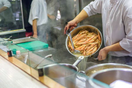chef cooking Miso Soupの写真素材