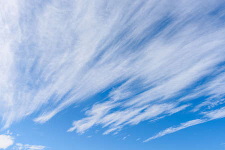 Beautiful cirrus clouds against the blue skyの写真素材