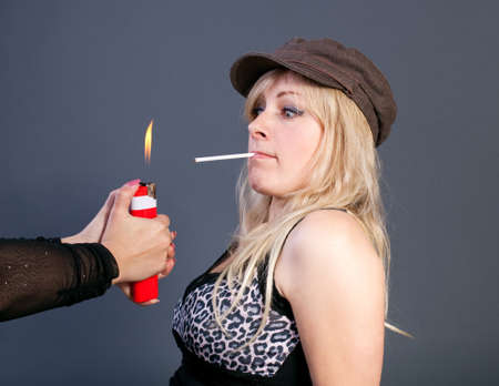 lighting a cigarette