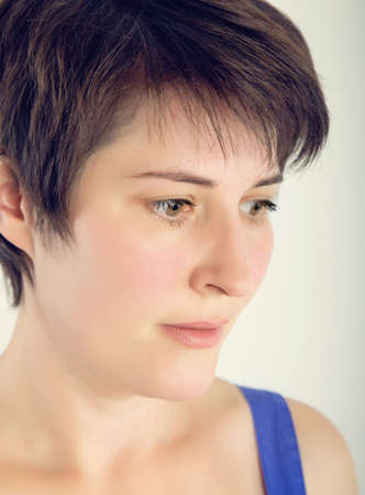 portrait of a beautiful young woman with short haircut
