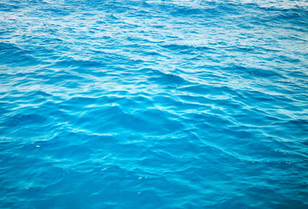 blue sea water surface with waves