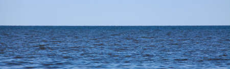 panorama of calm blue sea waterの写真素材