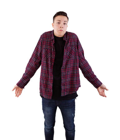 portrait of a young man shrugging shouldersの写真素材