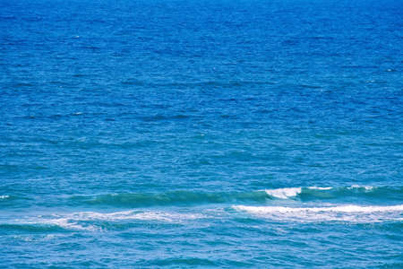 blue sea water surface with wavesの写真素材