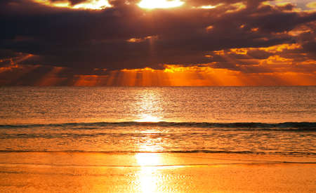 beautiful sunset over the oceanの写真素材