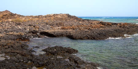 volcanic rocks on the beach