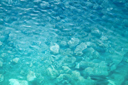 blue water background with ripplesの写真素材