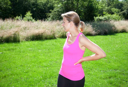 young fitness woman in a park