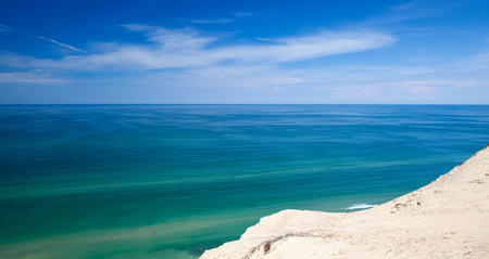 Blue sea water surface with seagullsの写真素材