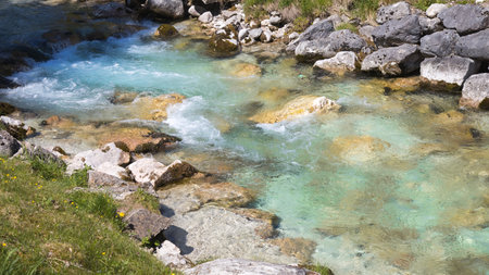Clear water in the river with rocksの写真素材